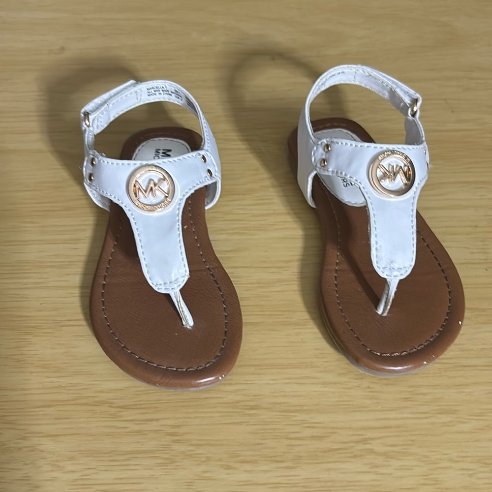 Used-girls white Micheal Kors sandals w/ velcro straps in the side, size 7